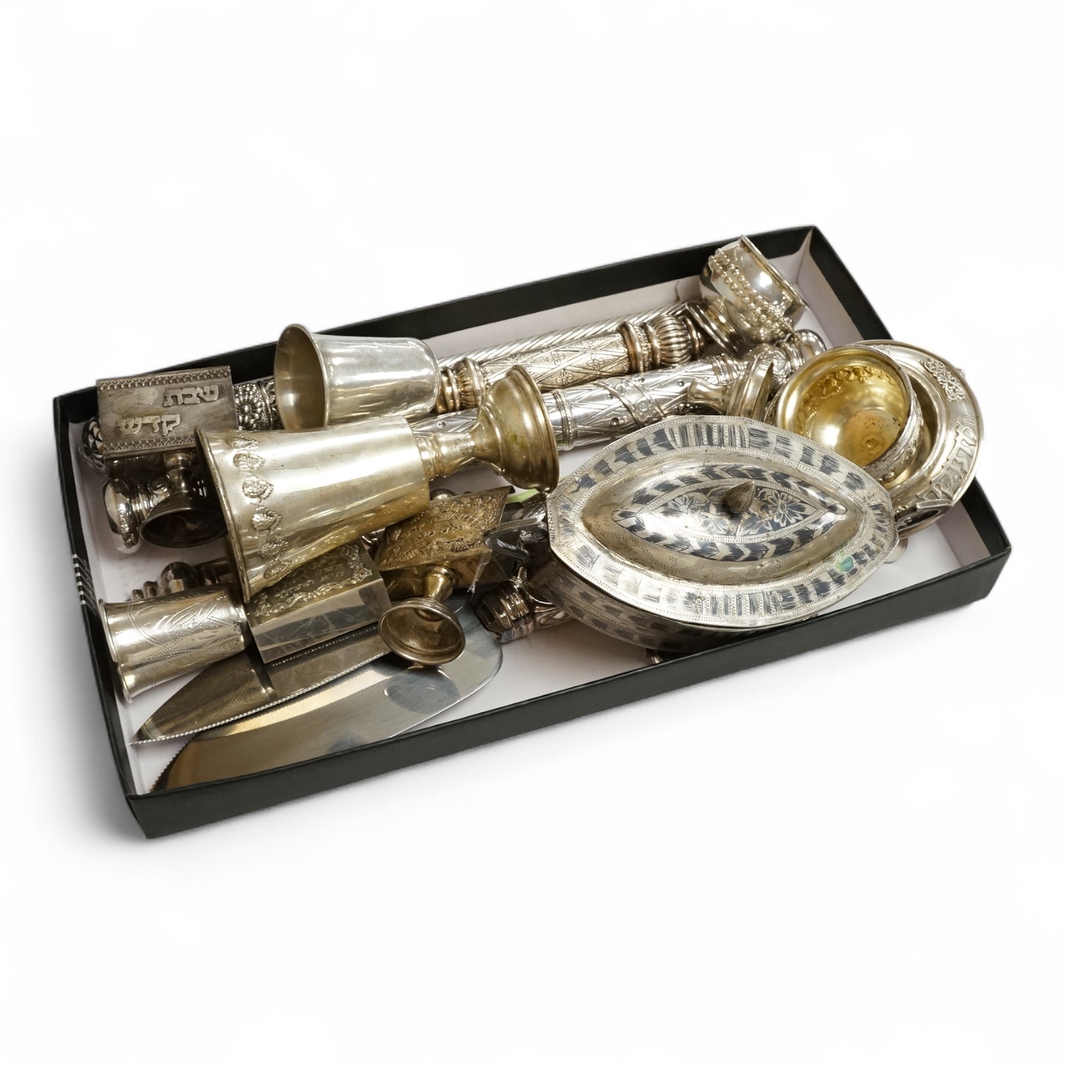 A small group of assorted continental 925 and other white metal items including a Judaic scroll holder, a Torah pointer?(lacking pointer), an Israeli ashtray, three Judaic match sleeves, two 925 handled servers and an Ir